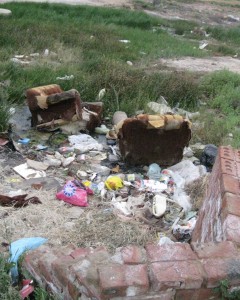 This garbage would not be left around some other area where there is more money. It would be picked up by the municipality. - Luphumlo Klaas