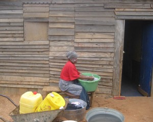 This woman is saving money by doing her own laundry. - Luphumlo Klaas